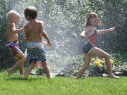 kids in sprinkler